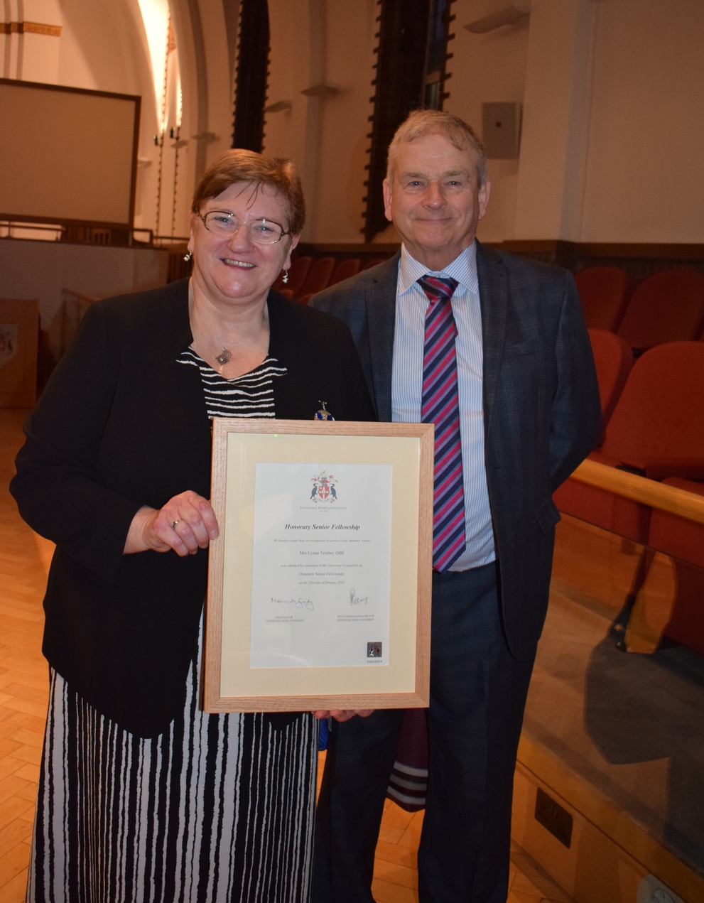 Lynne Tembey with Husband and Certificate