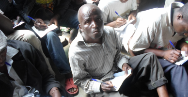 Prisoners crammed into every space, desperate to learn to read and write Prisoners learning to read and write