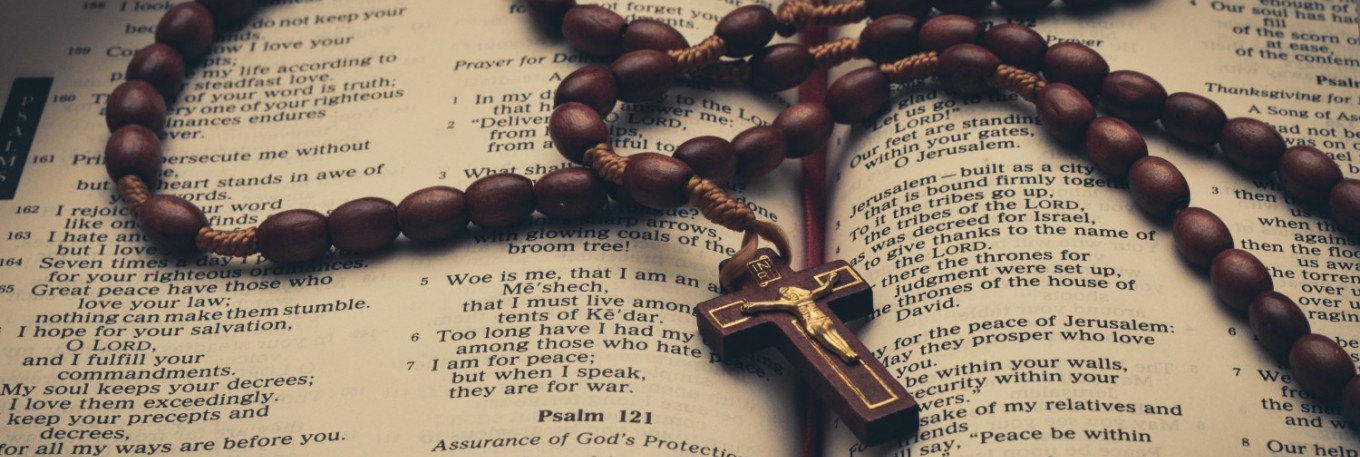 Necklace on open Bible
